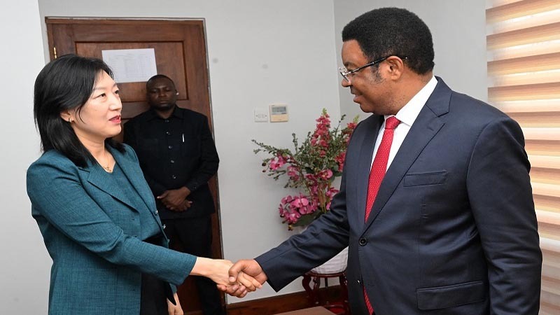 Prime Minister Kassim Majaliwa exchanges greetings with the Republic of Korea’s Ambassador to Tanzania, Ahn Enju, shortly before talks in Dar es Salaam yes-terday. 