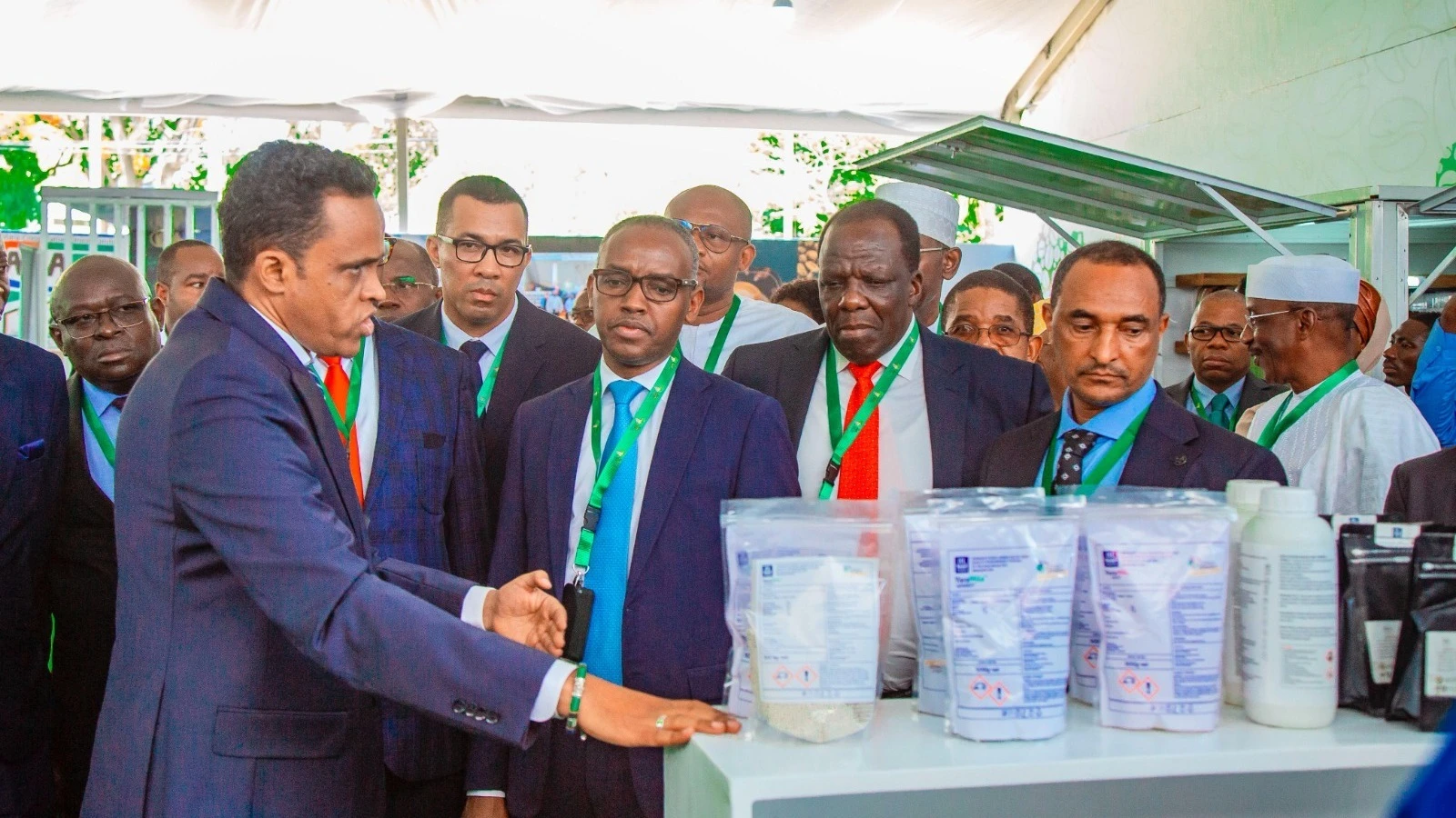 Minister for Agriculture Hussein Bashe visits one of the pavilion at the G25 coffee summit in Dar es Salaam