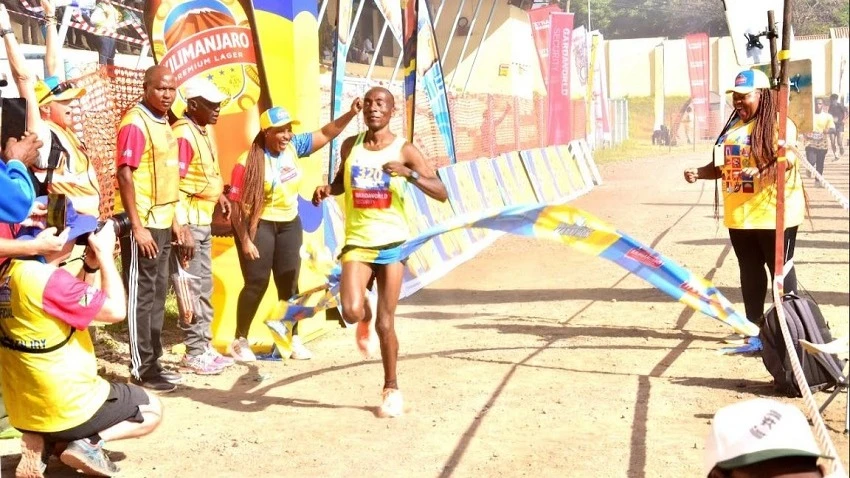 Hamis Athuman Misai pictured yesterday winning the Kilimanjaro International Marathon at the Ushirika Stadium in Moshi.