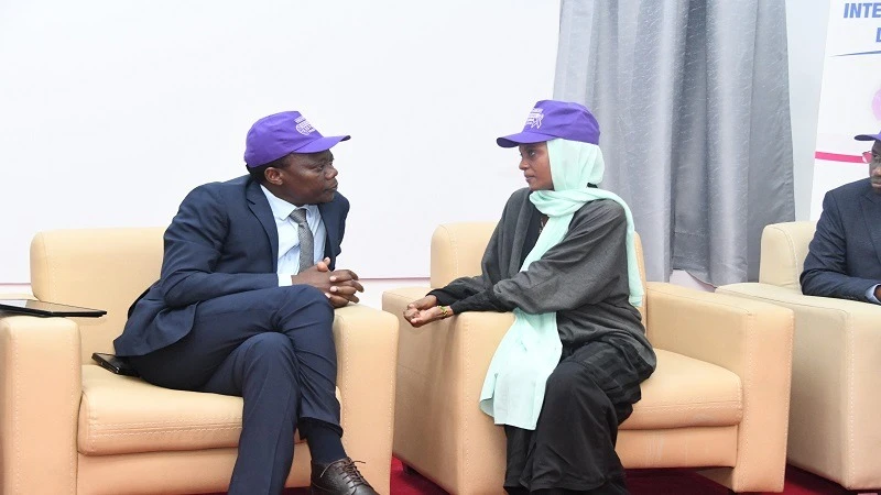 Deputy Health Minister, Dr Godwin Mollel (left), with Isrey Ayoub during the World Epilepsy Day commemorations held recently in Dar es Salaam.