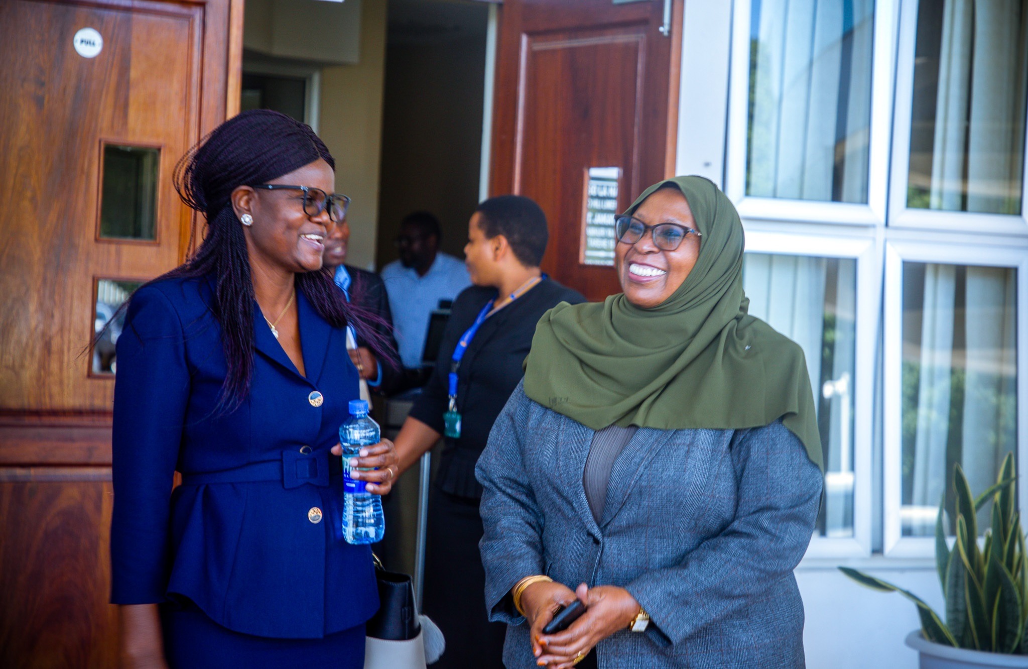 Finance Deputy Permanent Secretary Amina Khamis Shaaban (R) speaks with the Head of the Delegation of Senior Advisors to the Executive Directors of the African Development Bank (AfDB), Betty Ngoma, after their meeting in Dodoma yesterday.