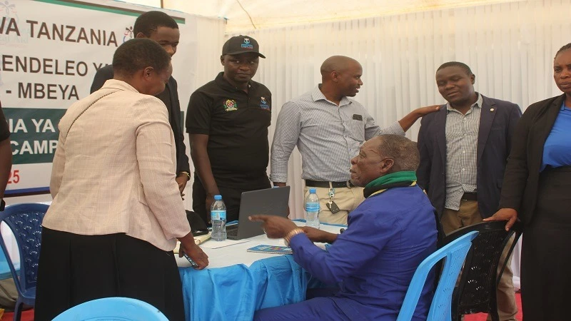 Legal and other experts with the Mama Samia Legal Aid Campaign pictured at the weekend attending to members of the public in Mbeya city. The team is scheduled to camp in Mbeya Region for ten days running. 