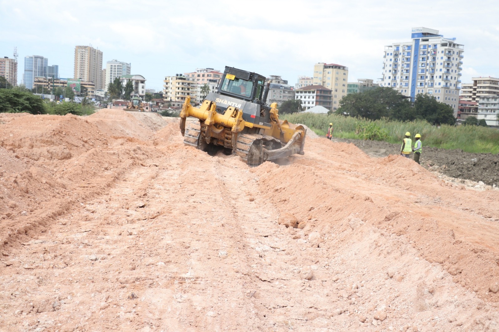  Construction of a bridge across the strategic Jangwani Valley stretch of Dar es Salaam’s Morogoro Road, which is expected to last two years, well under way yesterday alongside the development of diversion roads to ease the work. 