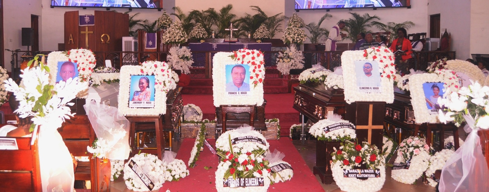  Coffins bearing the bodies of Francis Kaggi and his four children lined up during funeral service at the Evangelical Lutheran Church in Tanzania’s Kijitonyama Parish in Dar es Salaam yesterday. All five died in a road crash at the weekend .