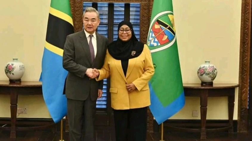 President Samia Suluhu Hassan with Chinese Foreign Minister Wang Yi at the State House in Dar es Salaam on Saturday.  
