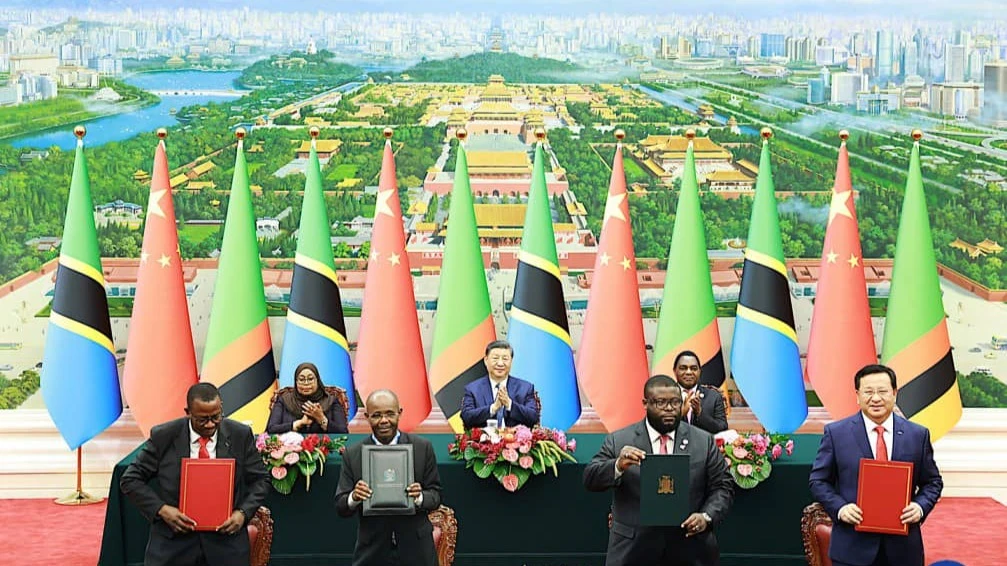 Chinese President Xi Jinping, Tanzanian President Samia Suluhu Hassan and Zambian President Hakainde Hichilema witness the signing of an MoU on the TAZARA railway revitalization project, September 4, 2024. 