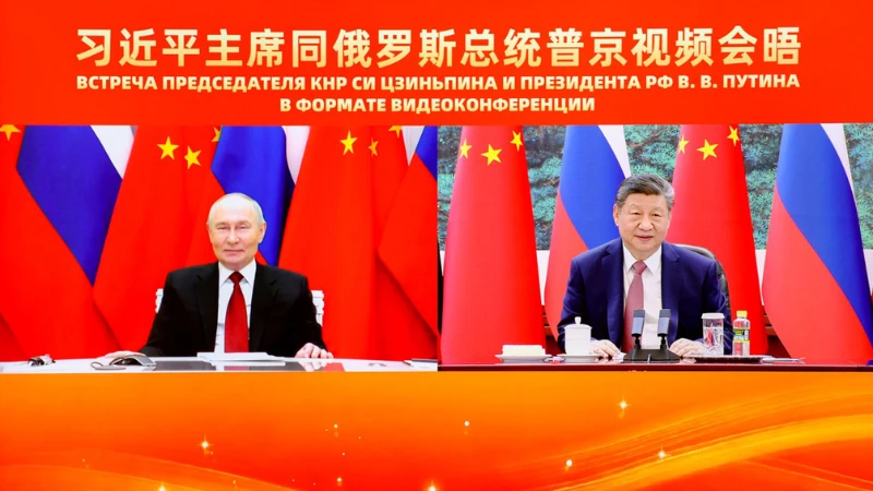Chinese President Xi Jinping holds a virtual meeting with Russian President Vladimir Putin at the Great Hall of the People in Beijing, capital of China, Feb. 4, 2026. 
