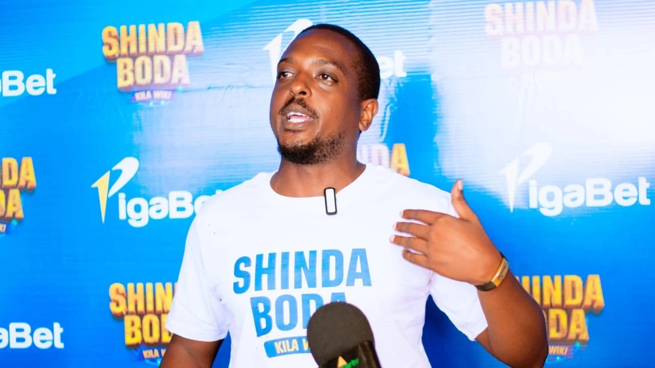 Marketing Manager of PigaBet, Alpha Kazola, speaking to journalists in Dar es Salaam.
