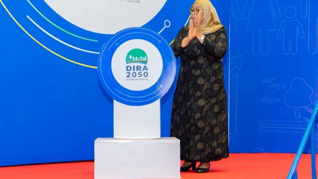 
President Samia Suluhu Hassan claps hands during the official inauguration of the National Development Vision 2050. 