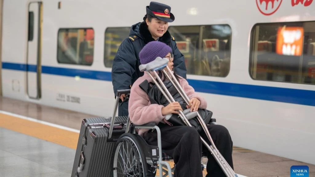 Xi Jinping, general secretary of the Communist Party of China (CPC) Central Committee, also Chinese president and chairman of the Central Military Commission, attends an annual gathering with non-CPC personages ahead of the Spring Festival,