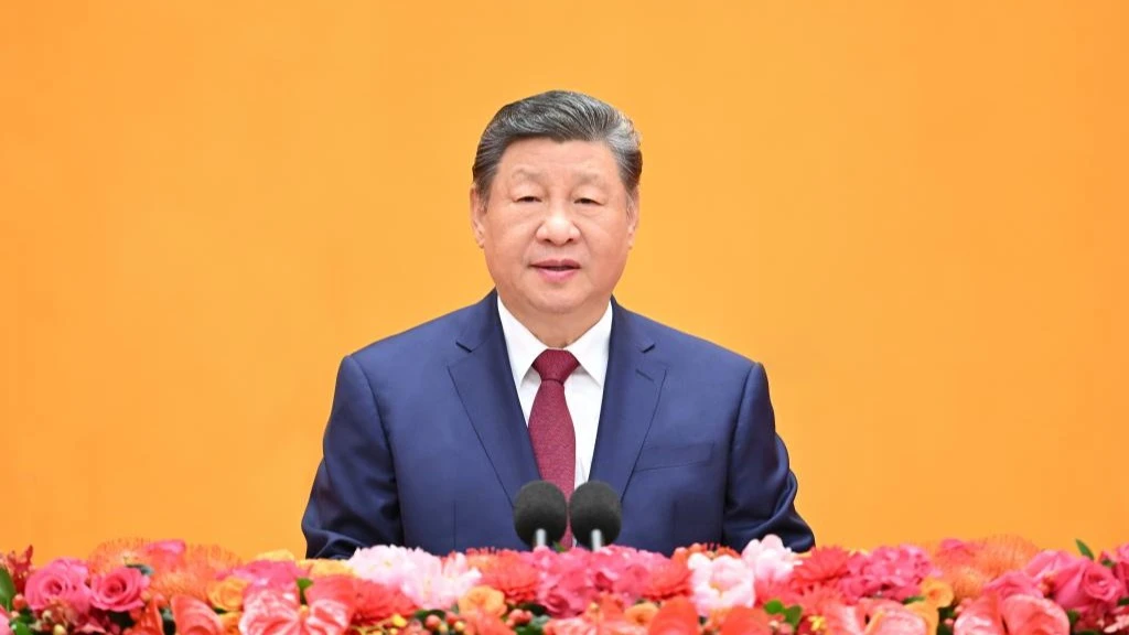 Chinese President Xi Jinping, also general secretary of the Communist Party of China (CPC) Central Committee and chairman of the Central Military Commission, delivers a speech at a reception to usher in the Chinese New Year at the Great Hall of the People